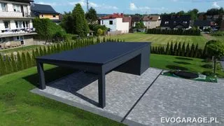 Garaż blaszany antracyt z wiatą — realizacja EVO GARAGE