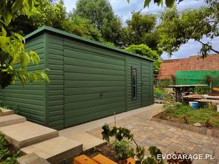 Garaż blaszany zielony jednostanowiskowy, brama roletowa — realizacja EVO GARAGE